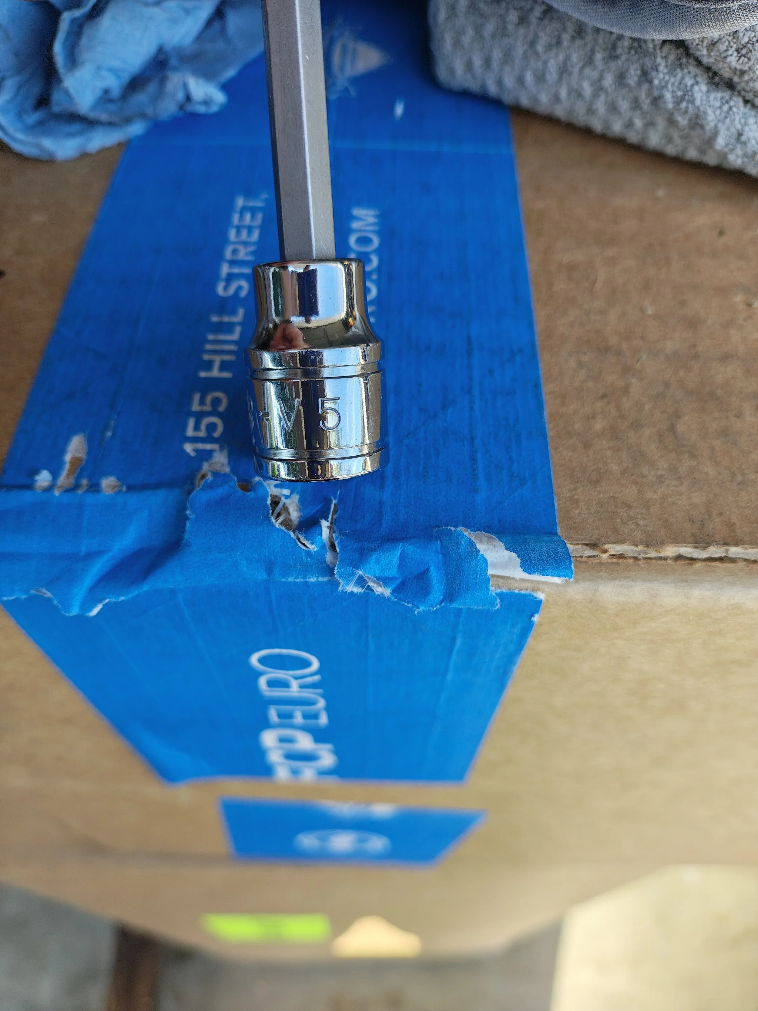 This is the 5mm Allen socket I used to loosen the wing bolts.