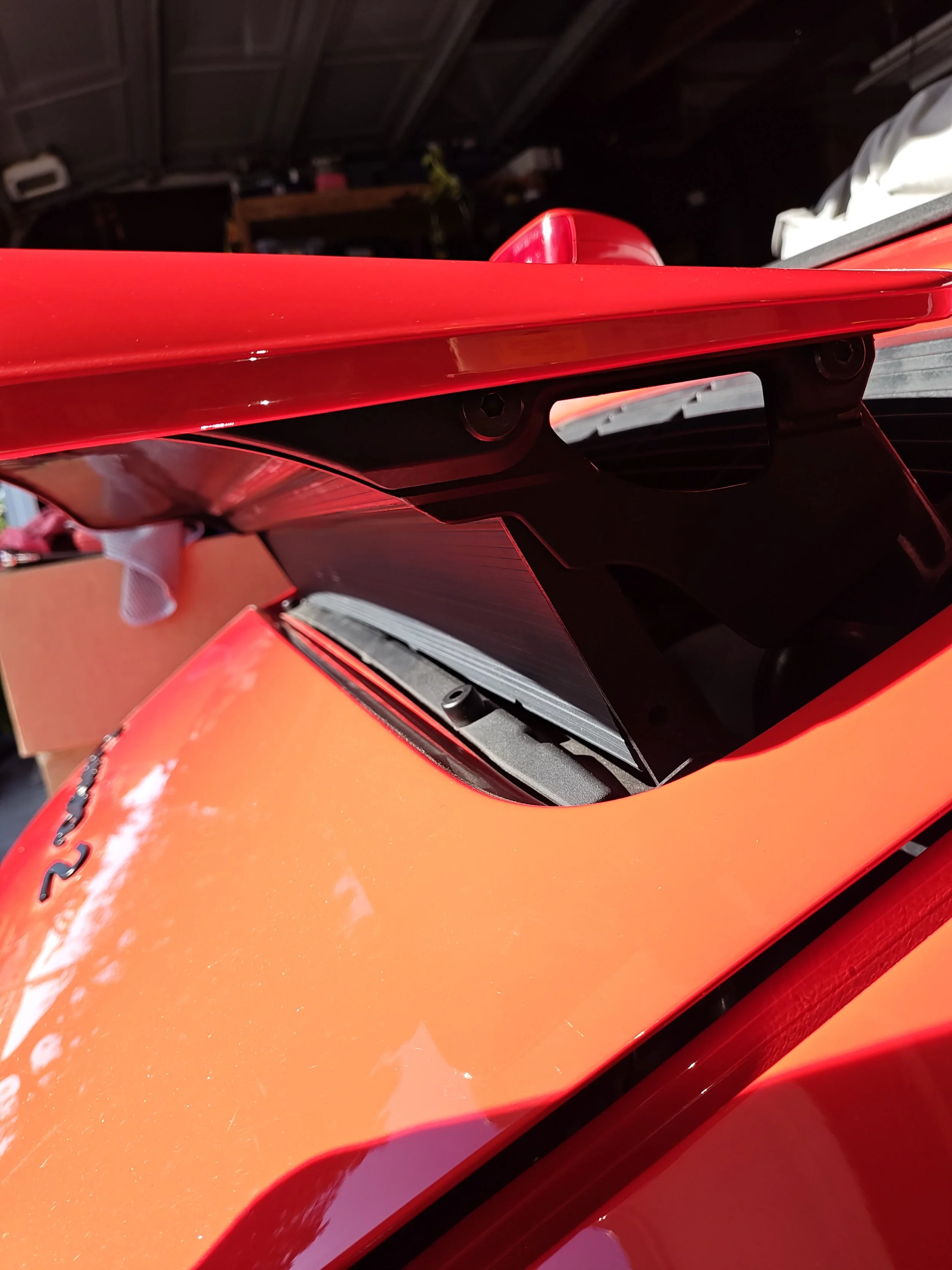 Open your spoiler all the way using the manual control inside the car.