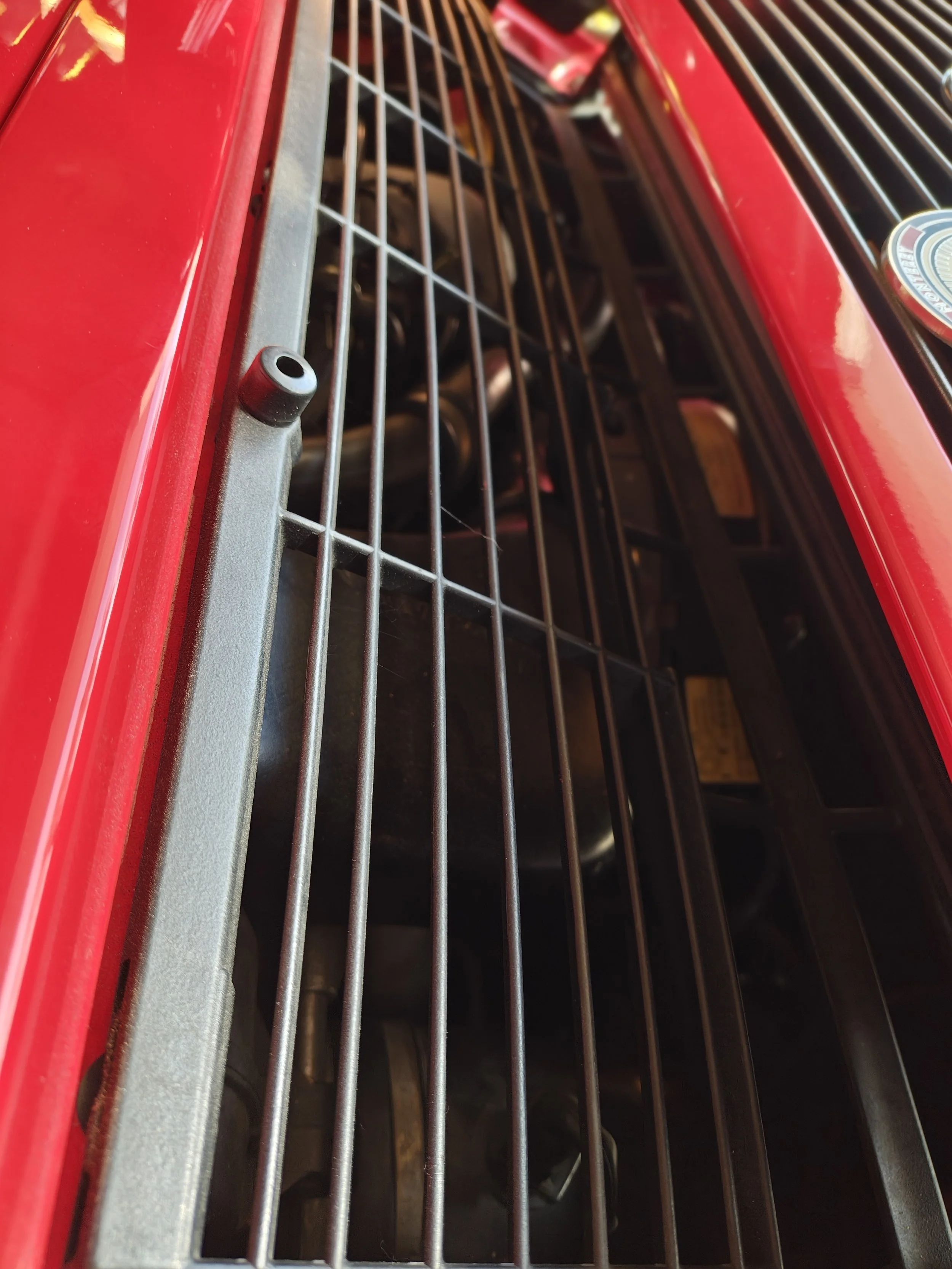 This is the view of the venting that you are working around.  You may find other spots have clearance on your specific model.  On my 1990 964 the location I found works.  Lower the wing slowly and double check the clearance.