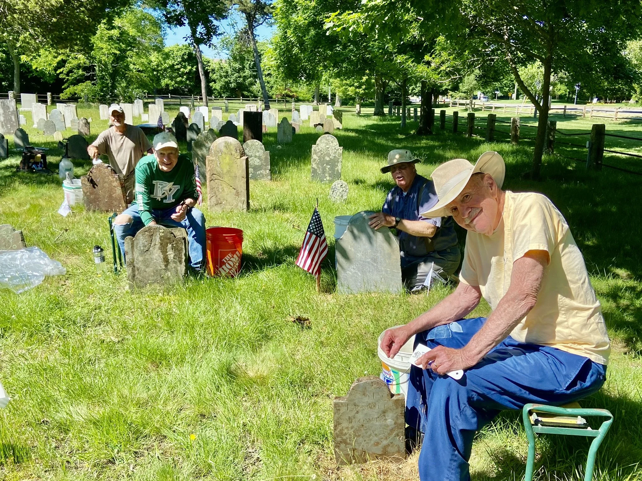 Crew Members Gather in Dennis Village Cemetery