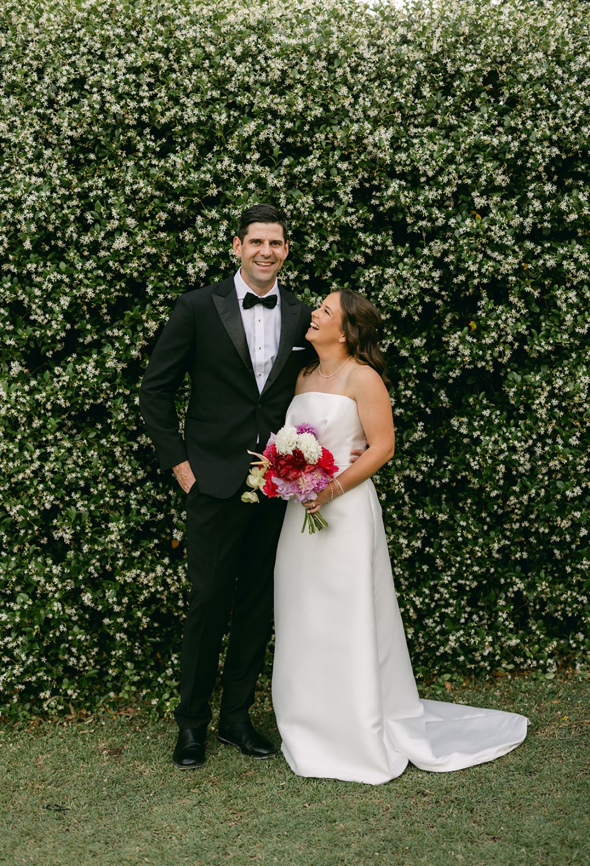 A bride and groom on their wedding day married by Love By Britt