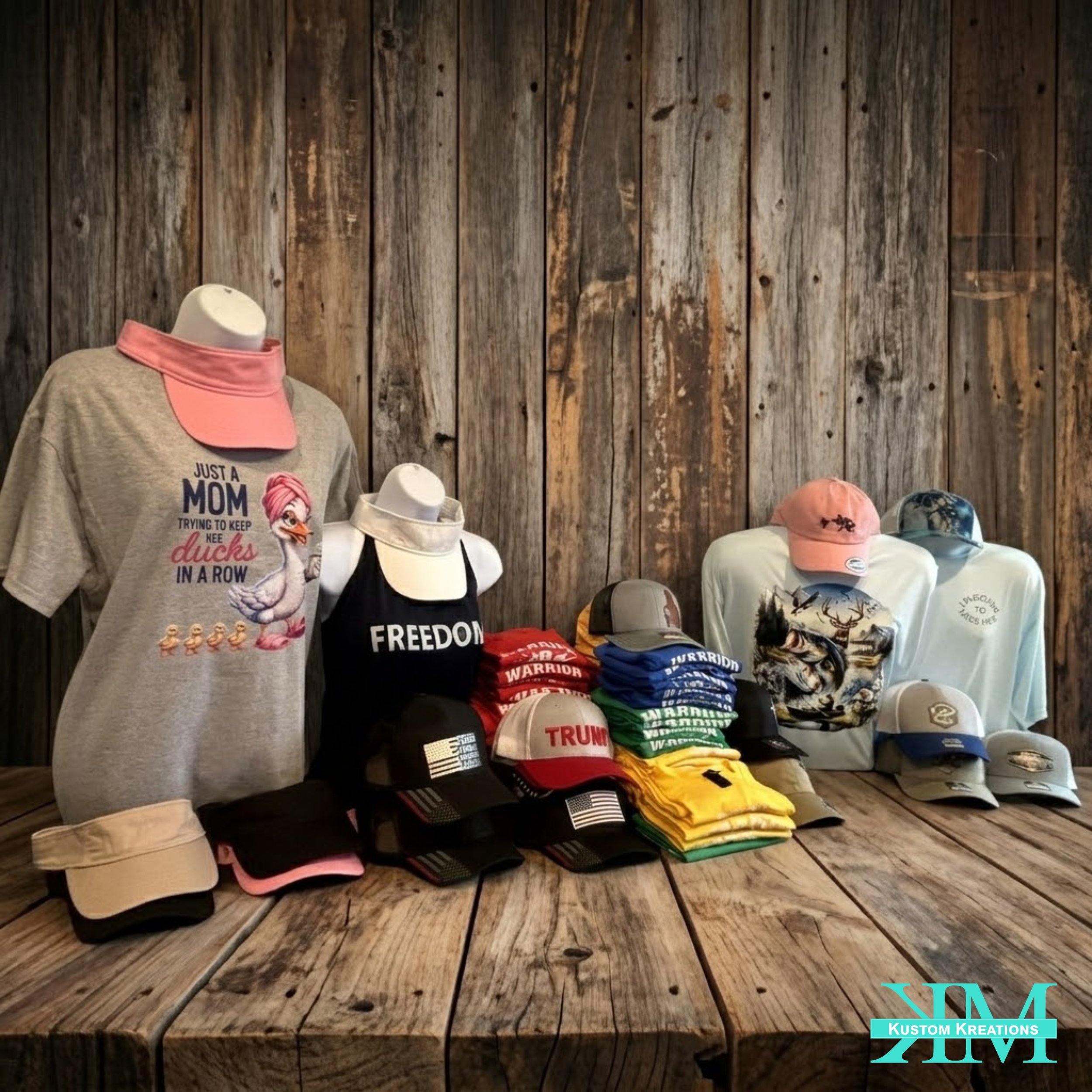 Collection of DTF printed graphic t-shirts and embroidered hats