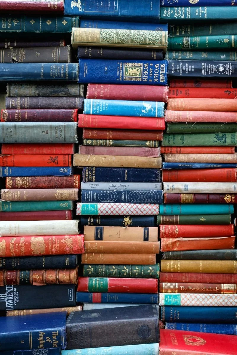 pile of books in three stacks from portobello road london