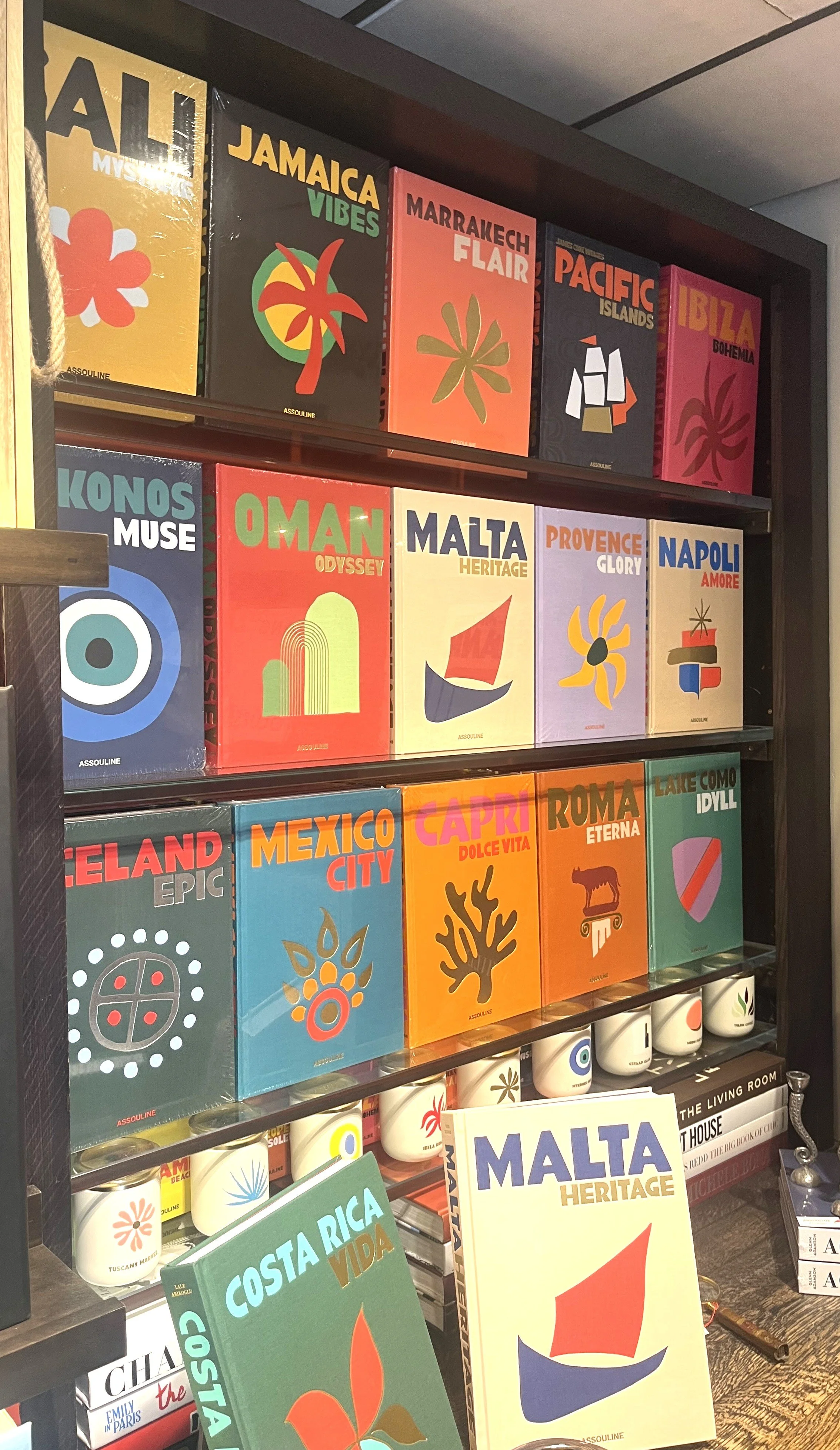 pretty wall of some of Assouline's best travel books