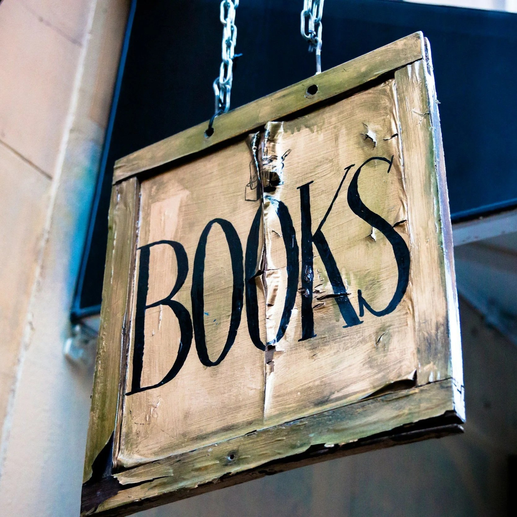 beautiful wood sign that says BOOKS