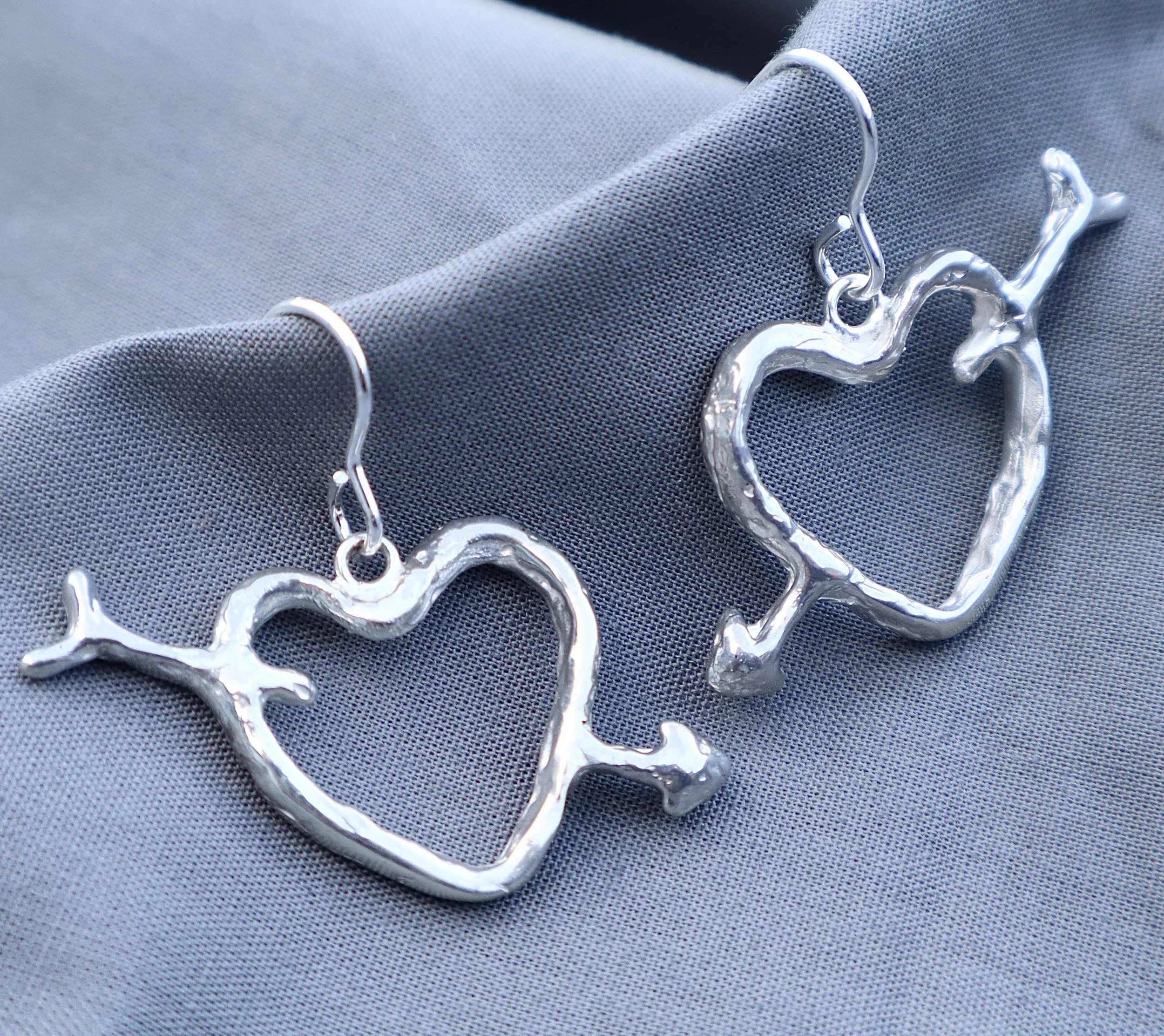 CUPID SILVER DROP EARRINGS