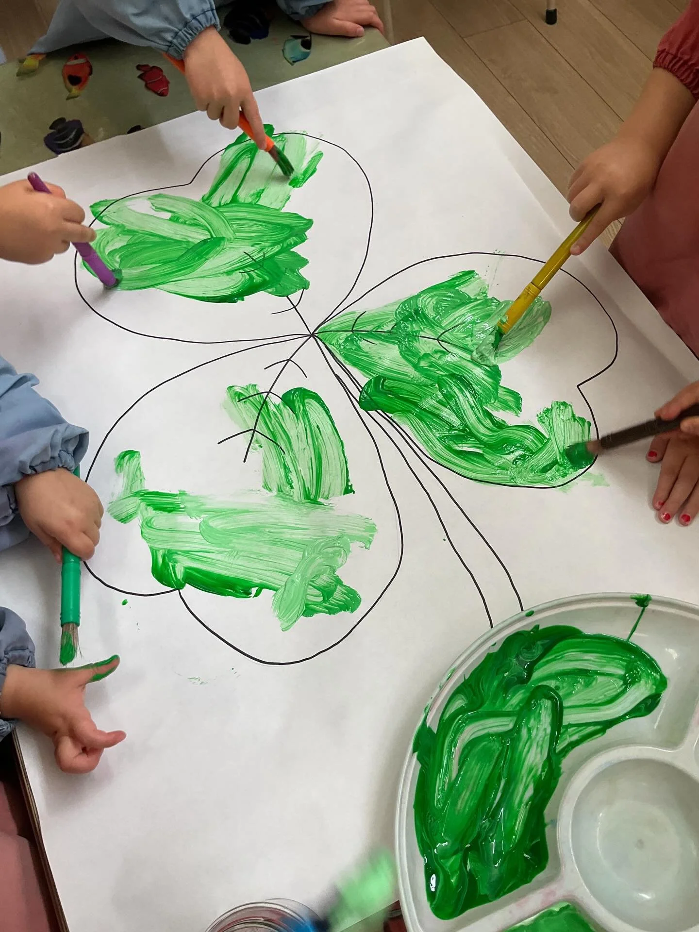 Painting our Lucky Shamrock 🍀

To celebrate Saint Patrick&rsquo;s Day, Children worked together to create a large shamrock using different shades of green. They shared materials, explored colour and added their own individual brush strokes to the gr