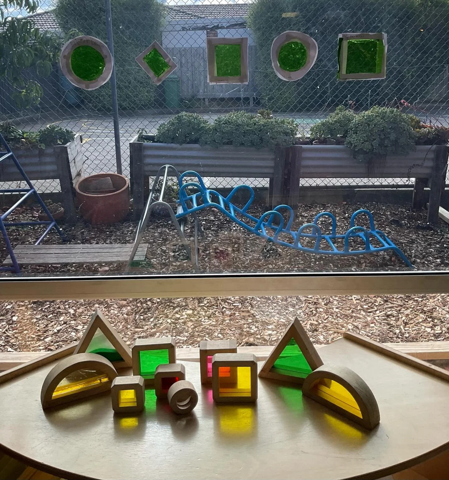 Children enjoyed creating their own sun catchers (dream catchers) using green glass paper and paper shapes. Children showed great focus and interest throughout the experience and were excited to place their sun catchers on the window once they were f