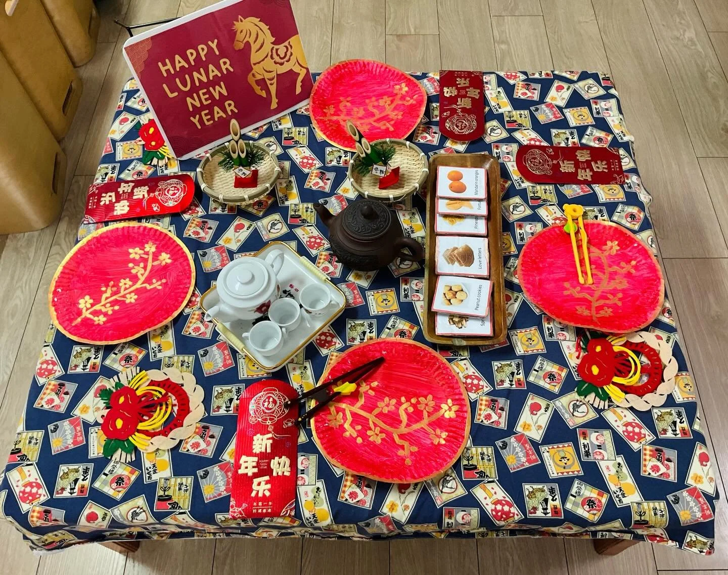 🧧 Lunar New Year learning through play!

We created a table invitation inspired by Chinese New Year to encourage:
🥢 fine motor skills
🍵 pretend play + language
🌸 cultural awareness

#lunarnewyear2026🐴🧧🪭 #chinesenewyear #learningthroughplay #ea