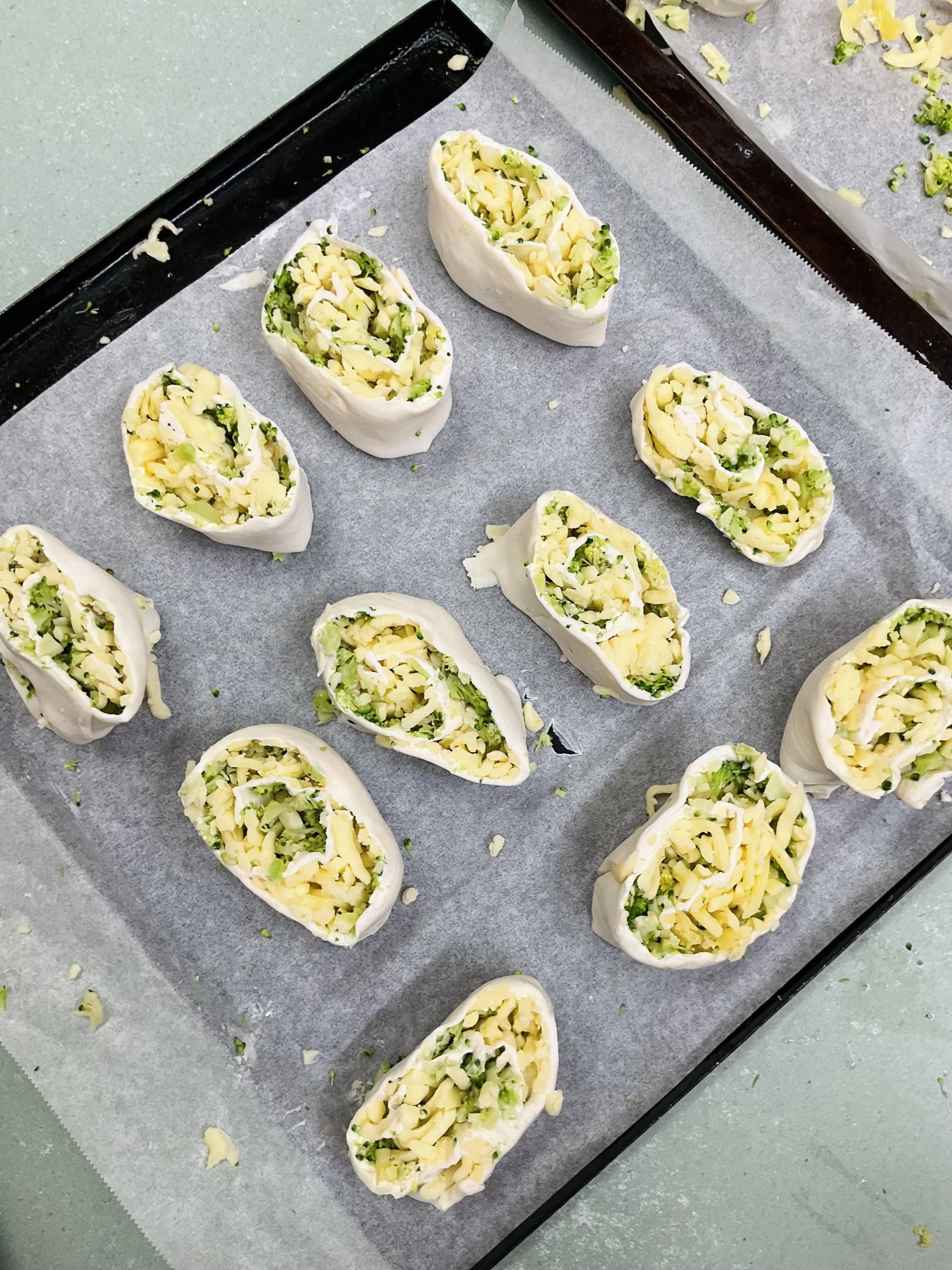 Making cheese and broccoli scrolls