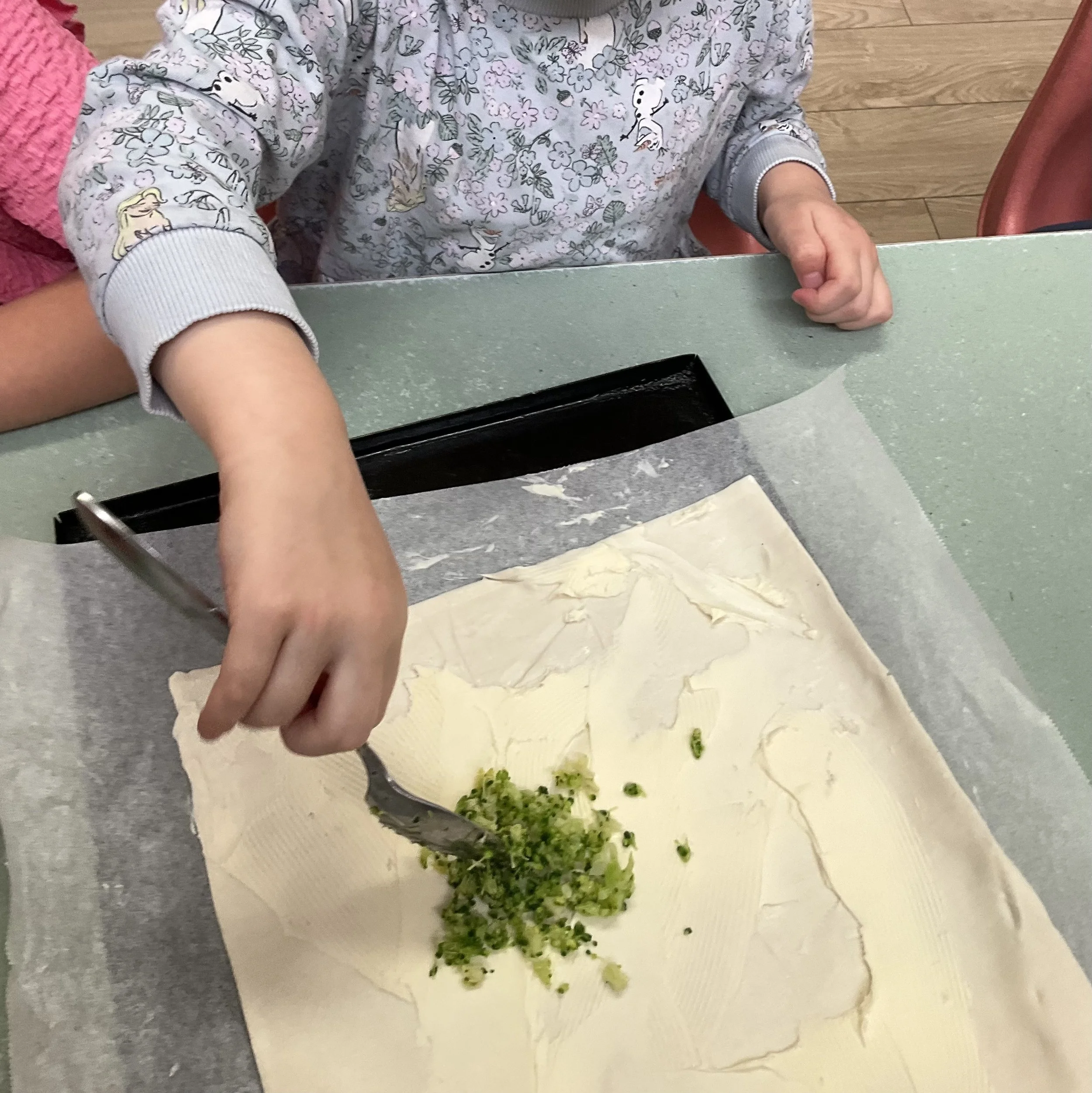 Making cheese and broccoli scrolls