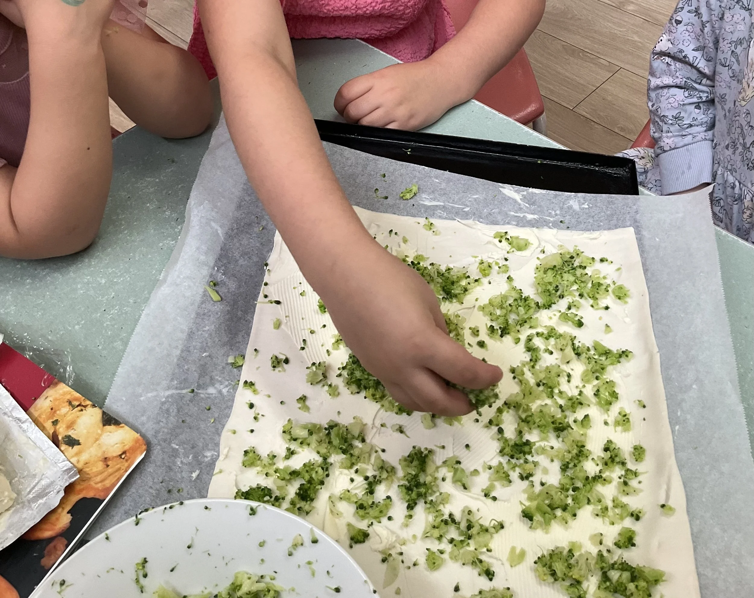 Making cheese and broccoli scrolls