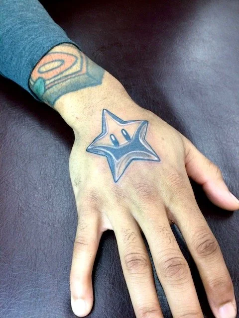 bg hand lucky star.jpeg