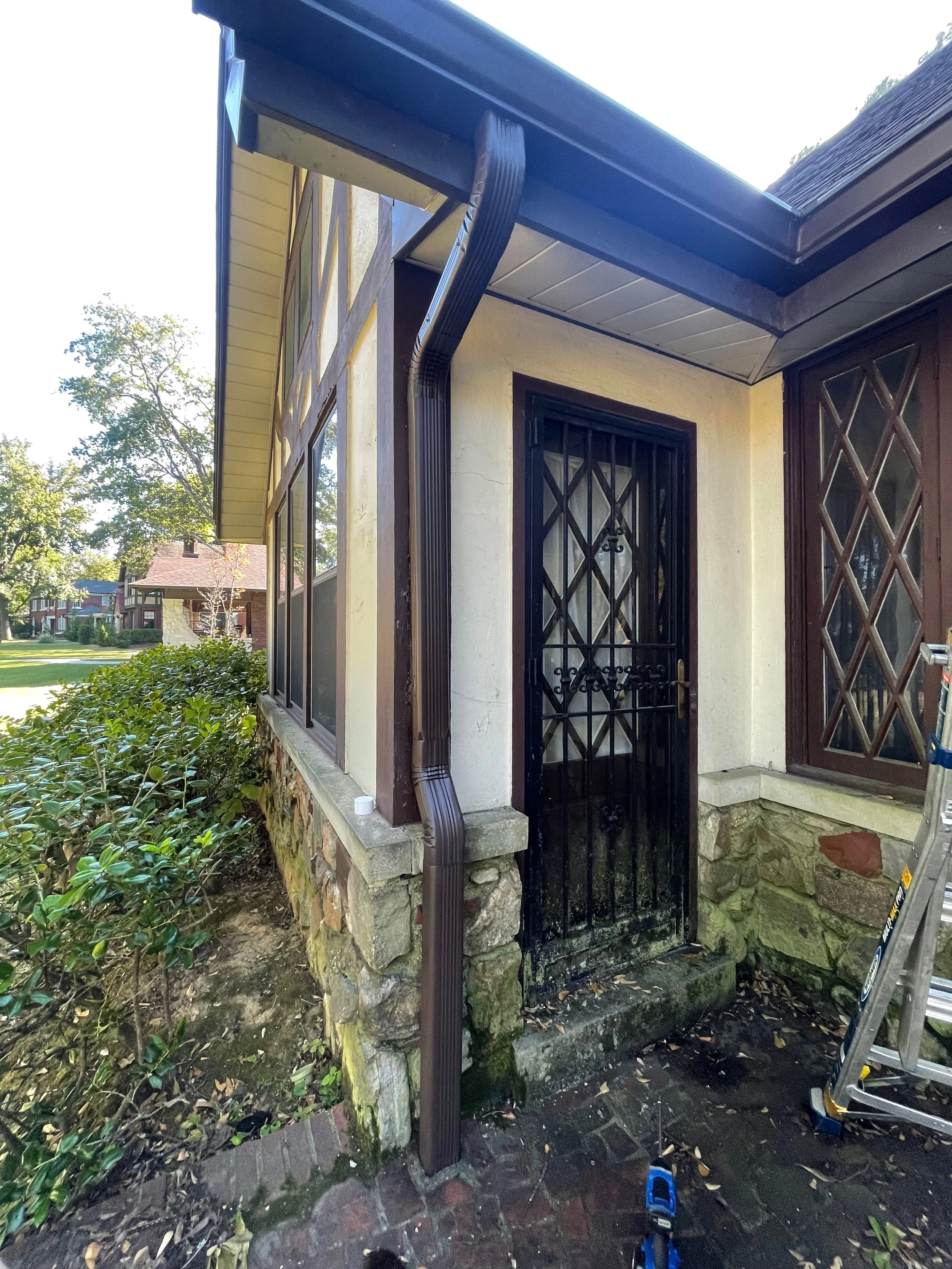 Residential Downpout Installation Musket Brown