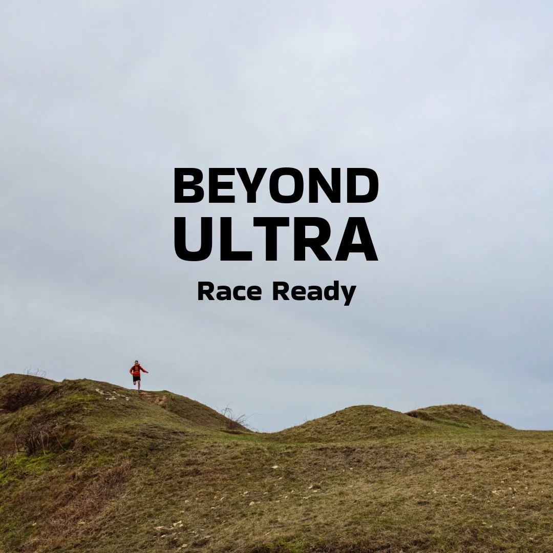 A person running uphill on a grassy hill with a cloudy sky background and the text 'BEYOND ULTRA Race Ready' in the center.