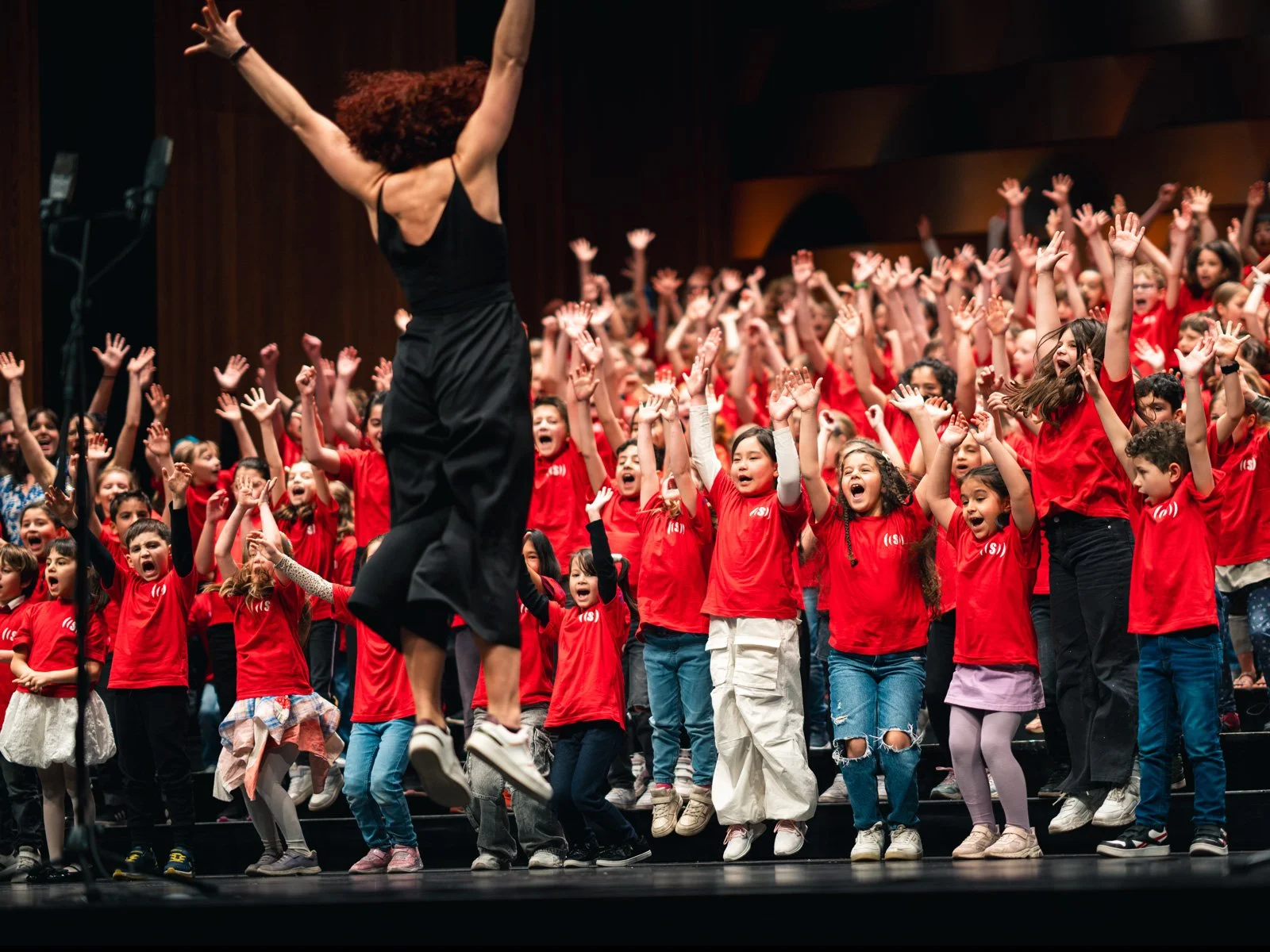The stage is full of kids at the yearly Superar concert.