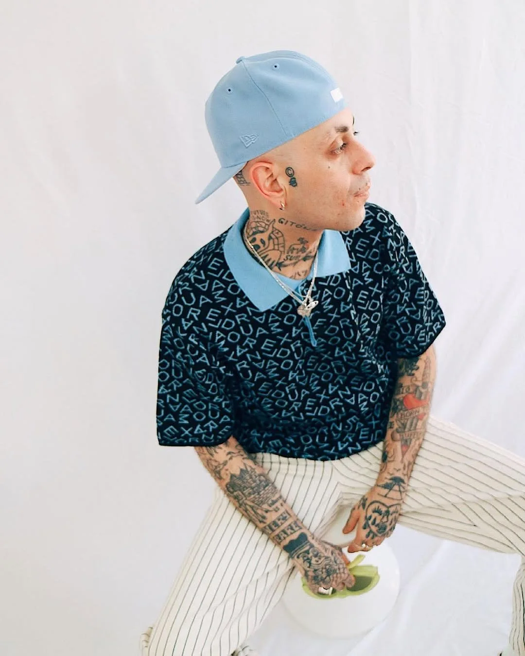 @internet_is_a_lie wearing our Blue Knitted Polo Shirt and our AM Fluorescent Socks#AlexandraMou.jpg