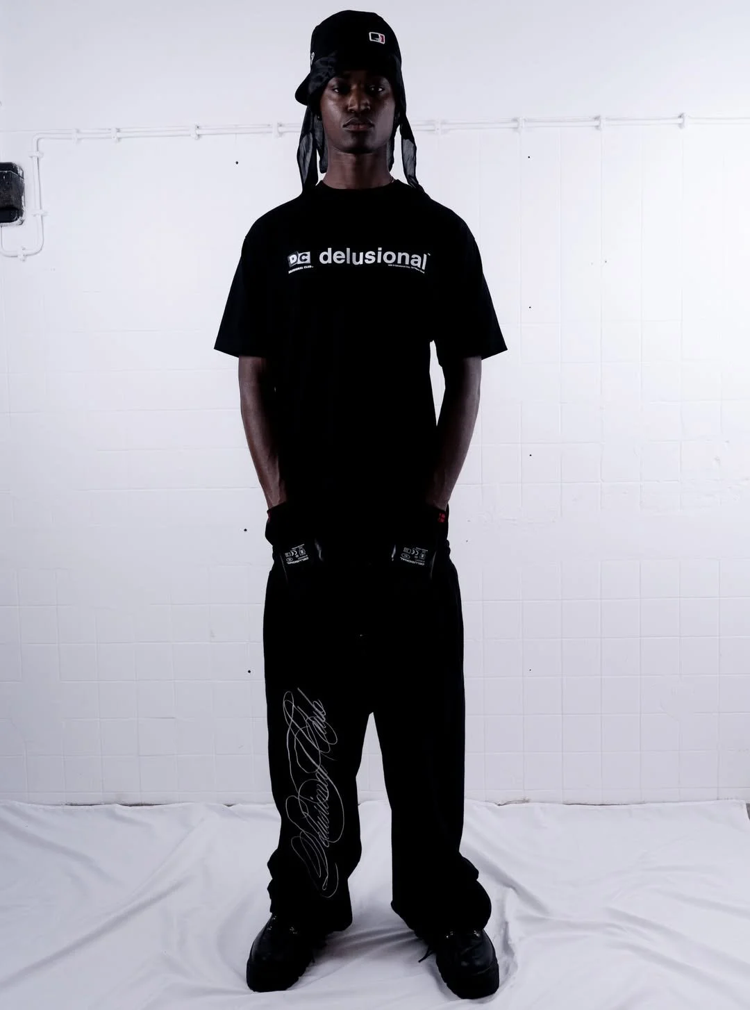 NEW DC T-SHIRT & FITTED CAP. WHOLE FIT AVAILABLE ONLINE WWW.DELUSIONAL-CLUB.COMLOOK 4MODEL- @gel.jpg