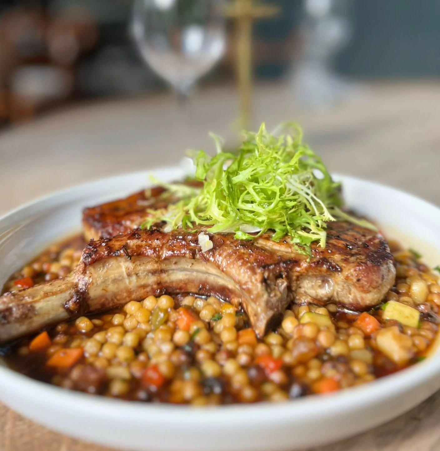 Grilled Short Pork Tomahawk served with fregola, grilled Mediterranean vegetables and a Madeira sauce.

#gastropubs  #londonexplorer  #londonpubs
