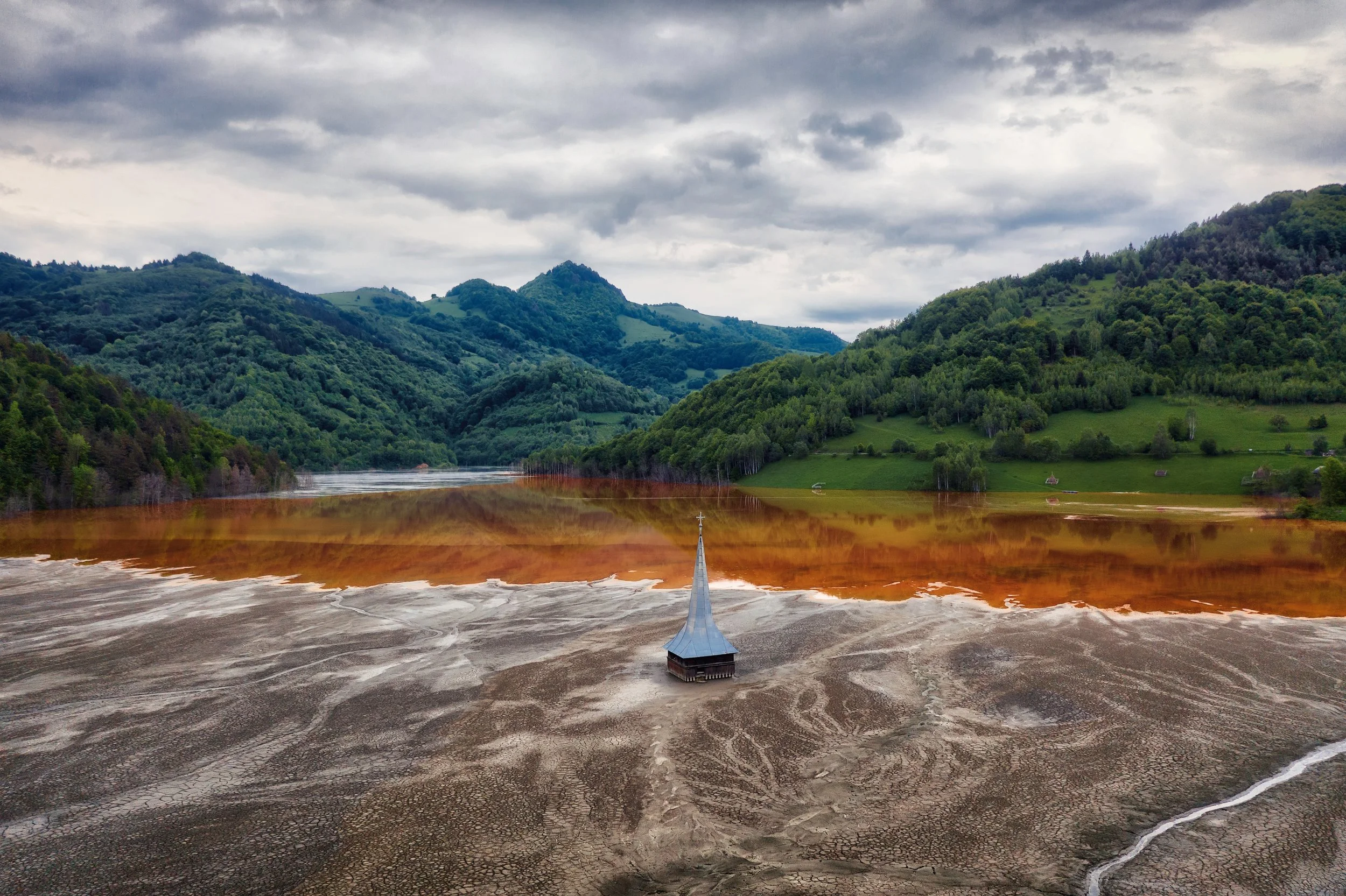 The drowned village of Geamana in Romania, where the industrial wastewater from a nearby copper mine was pumped into a previously fertile valley.