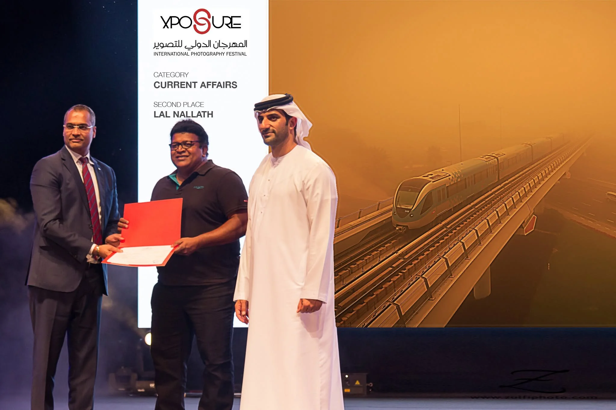 Xposure Photography Competition 2016
Second place in the current Affairs category.
Winning image in the background
"METRO running on a Sandstorm day". Cash Prize USD 750