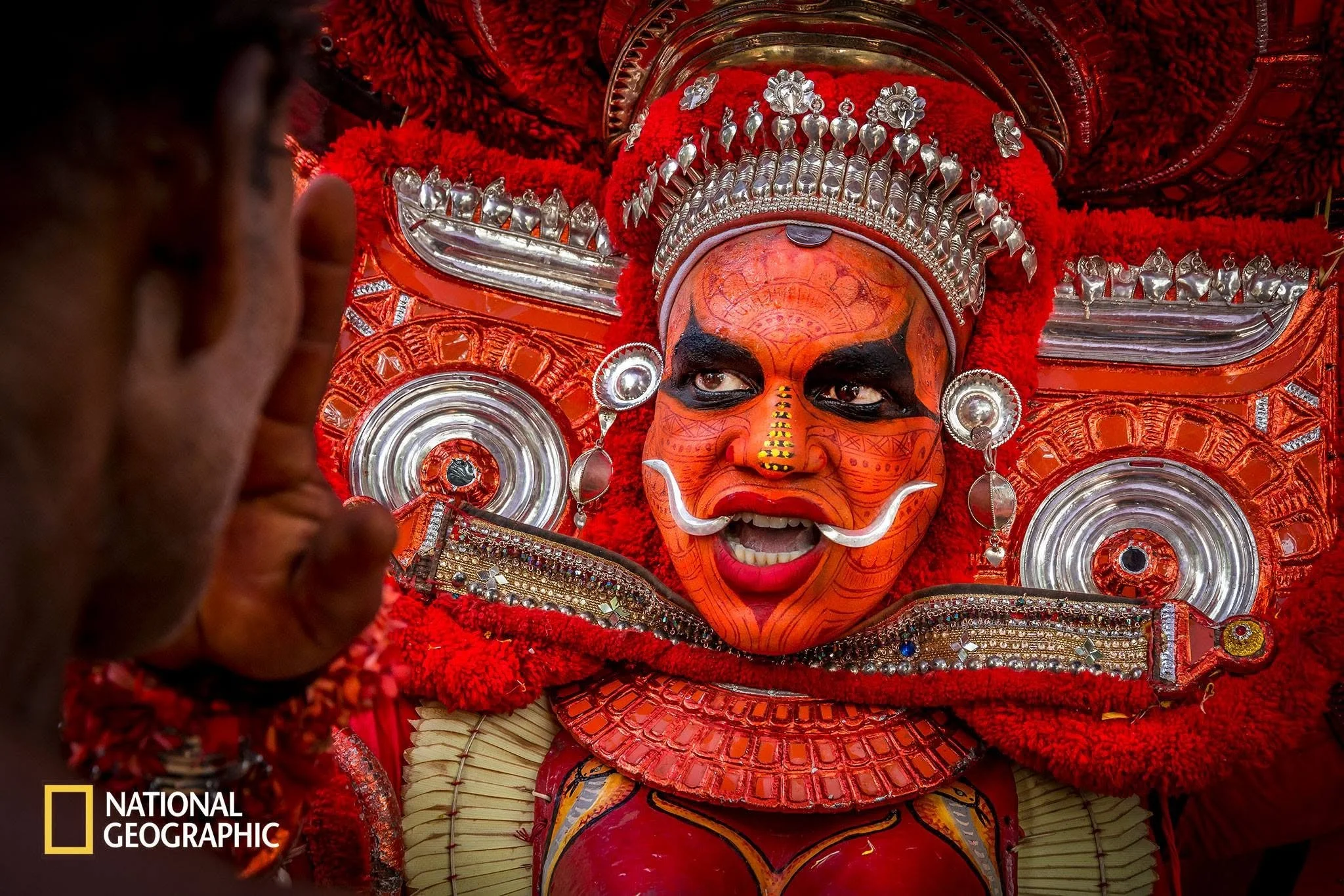 Picture taken in Kannur Kerala, Theyyam is a popular traditional Art form of Kerala. This image got published in the Daily Dozen part of National Geographic.