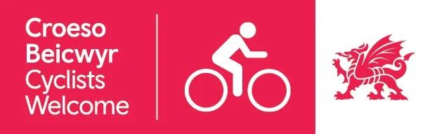 Cyclists Welcome accreditation logo from Visit Wales highlighting that Coety Bach is certified cyclist friendly accommodation near Llandrindod Wells.