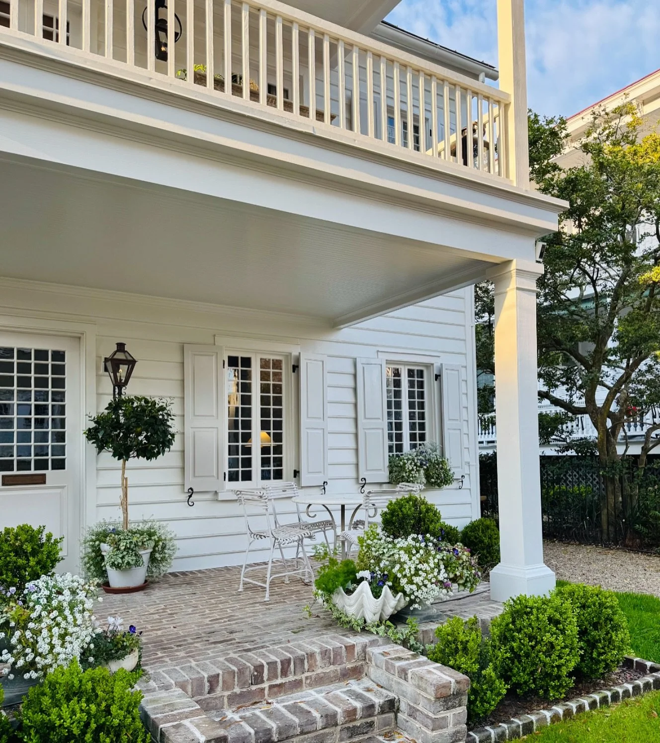 A front porch is a home&rsquo;s first impression&mdash;it&rsquo;s a statement, a sanctuary, and the perfect spot for a drink with friends. 🍸🤍🌳
.
.
.
.
#InteriorInspo
#DesignGoals
#ModernClassic
#HomeAesthetic
#PorchVibes
#SouthernCharm
#NeutralPal