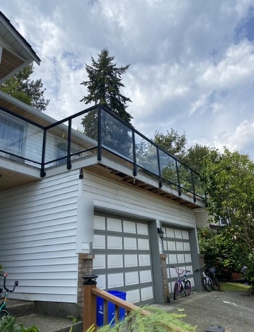 Deck extension with glass railing