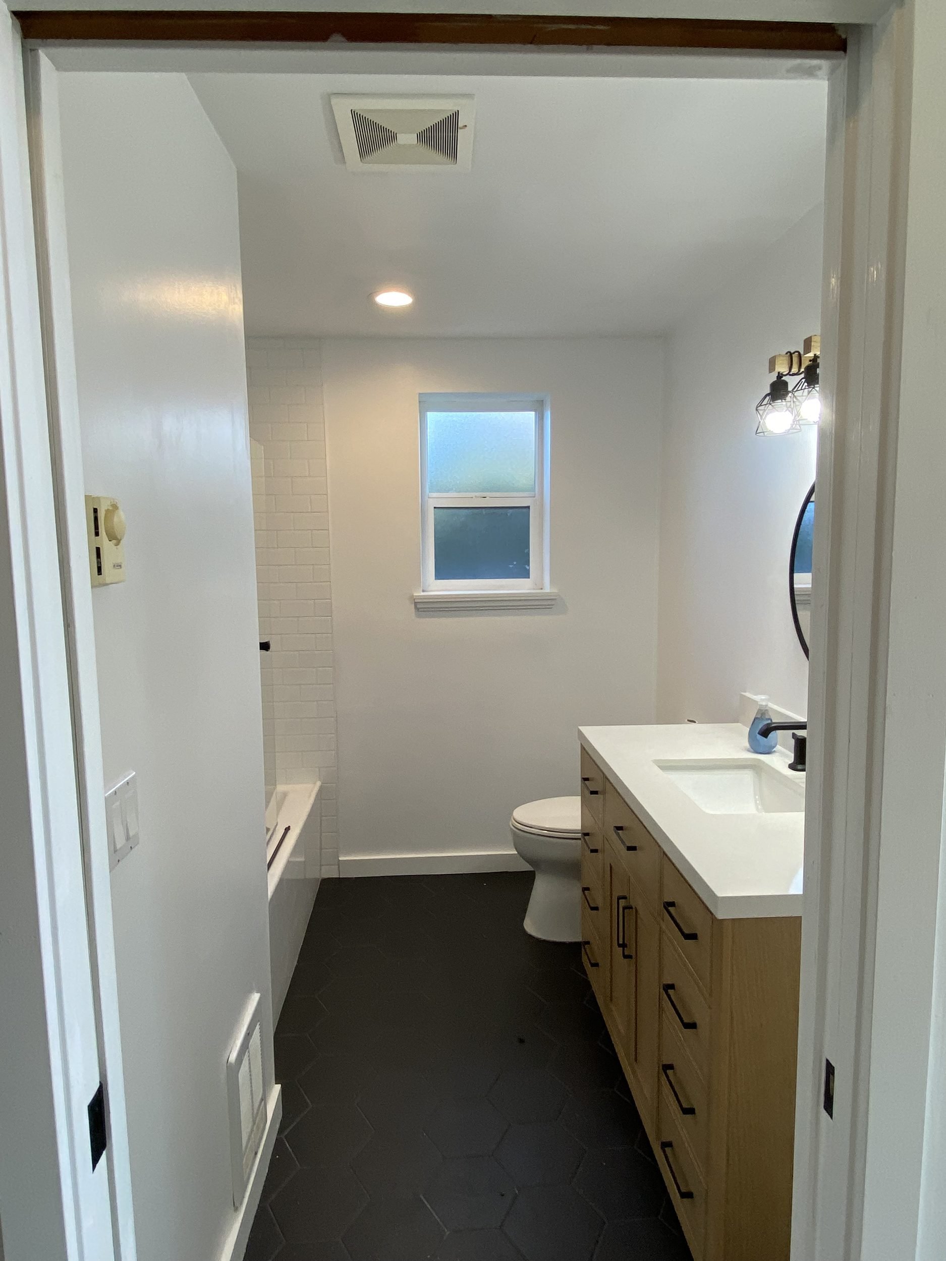 Bathroom remodel with porcelain subway tile, Saturna Place