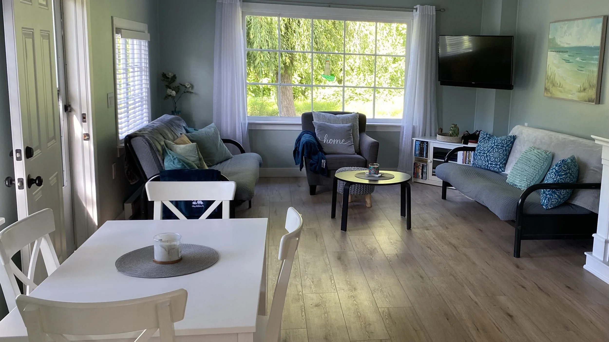 Finished living and dining room renovation by Bullseye Renovations