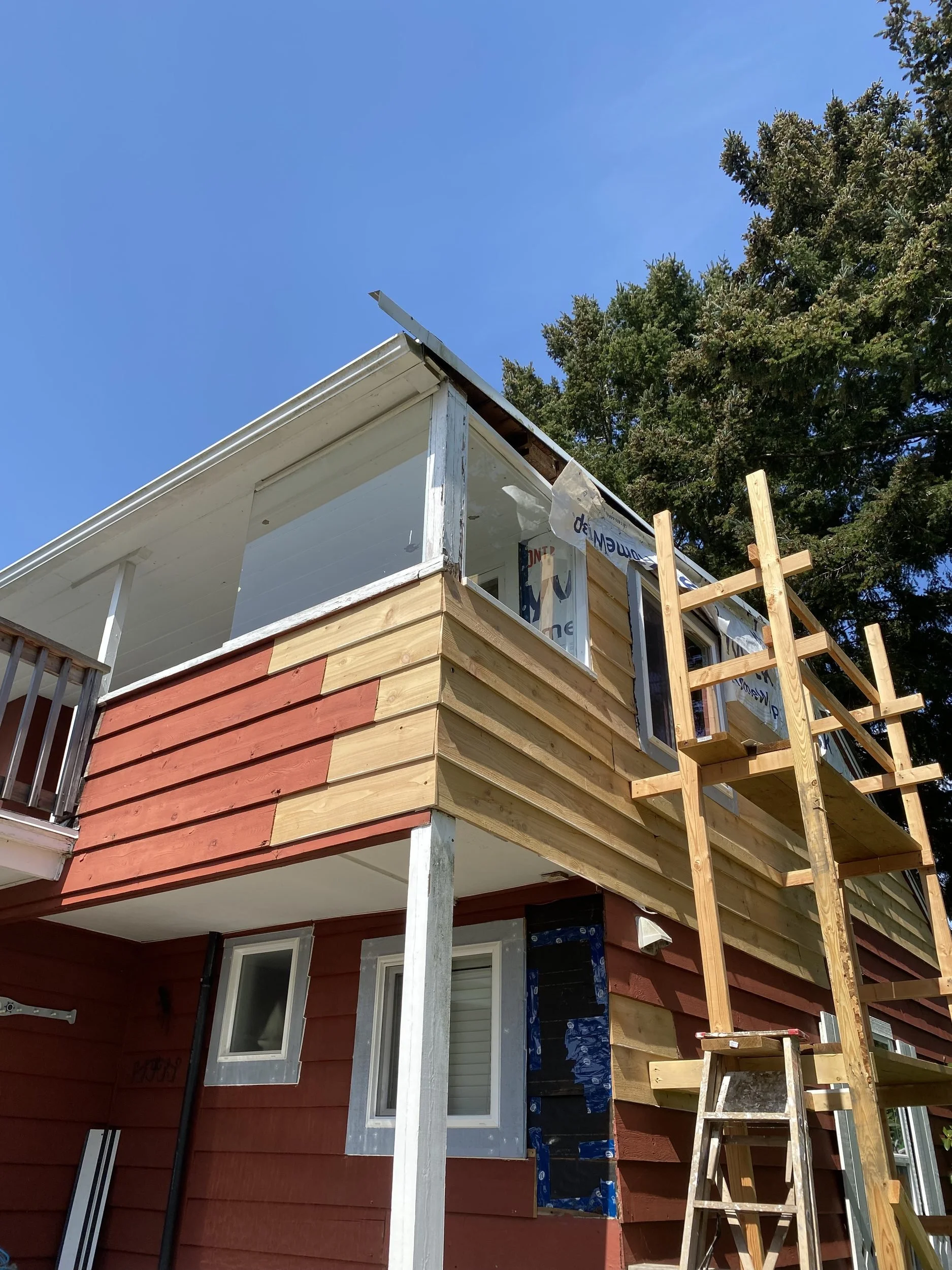 New beveled cedar siding, Ash Avenue