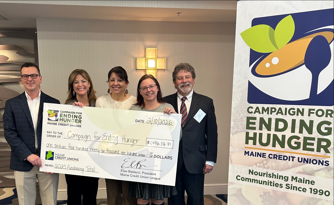 Big Check - Group Photo.png