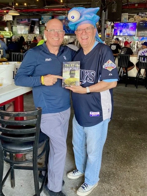 Ferg's owner admires the book