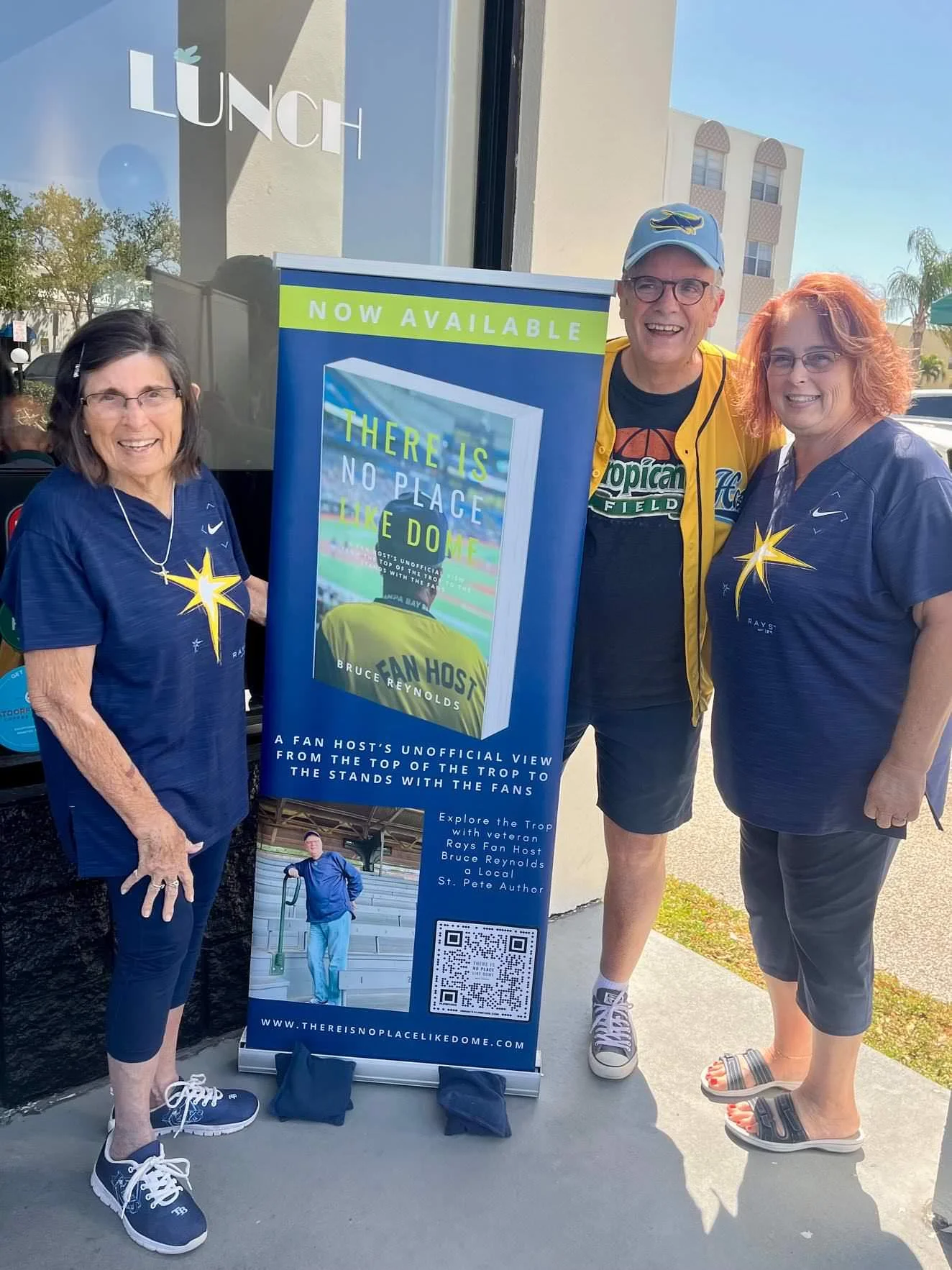 Season ticket holders smiling at their Fan Host