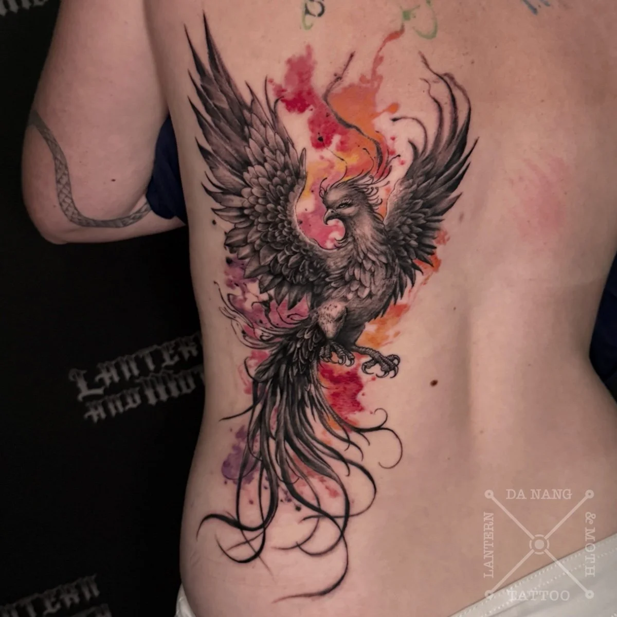 Phoenix and watercolour background design by Da Nang tattoo artist