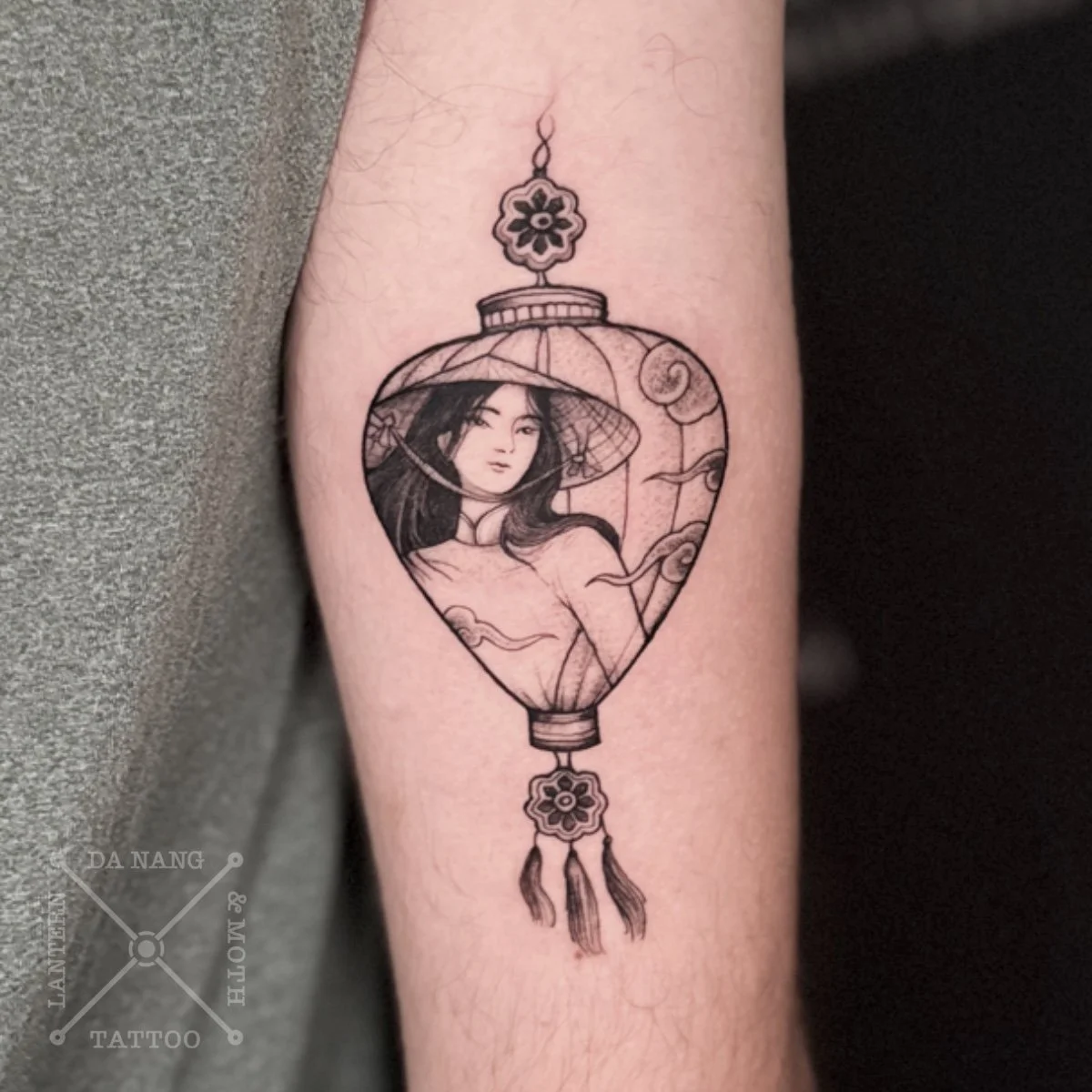 Vietnamese lantern and lady tattoo, Da Nang, Vietnam.