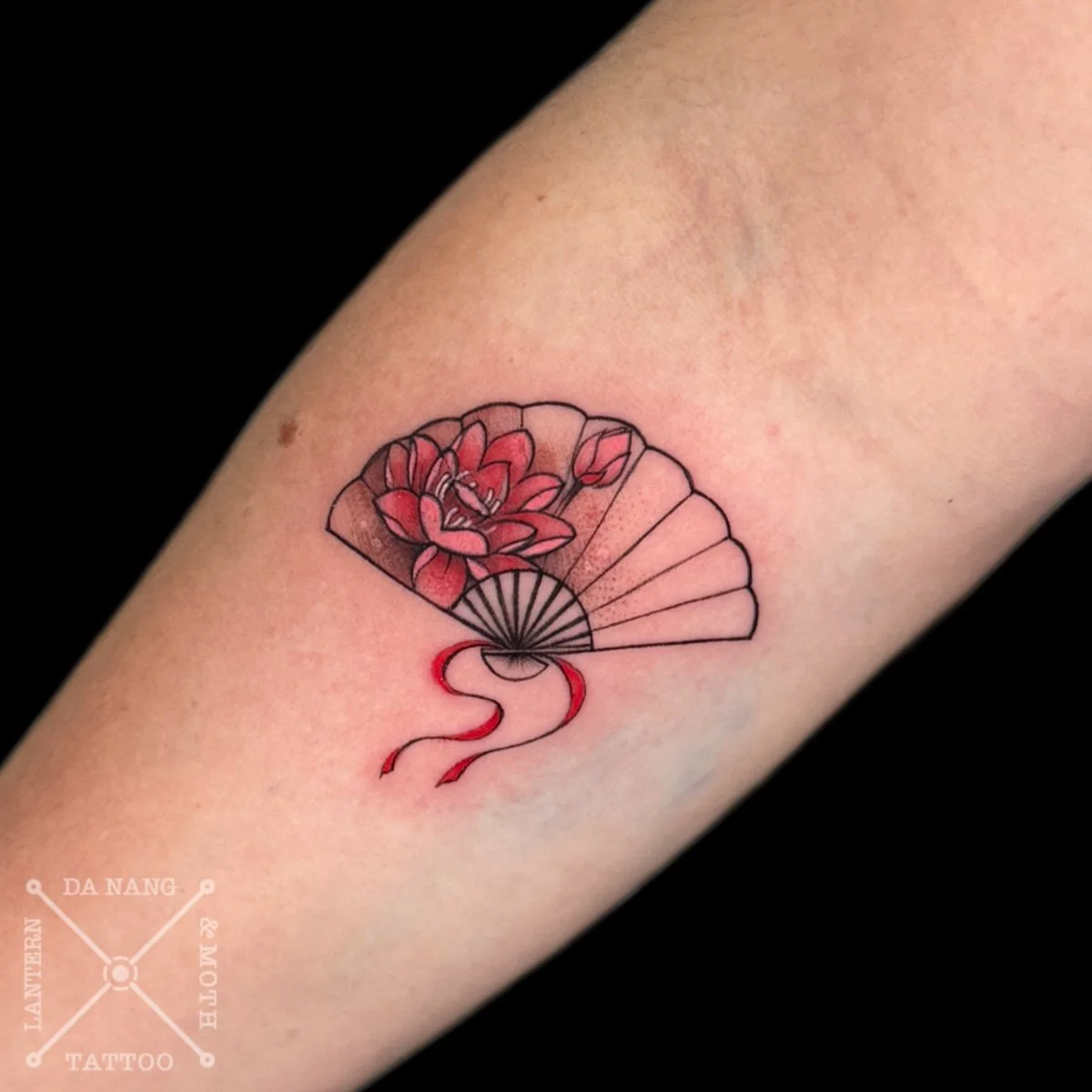 Fine Line Vietnamese Fan tattoo at Lantern and Moth Tattoo Danang, Vietnam.