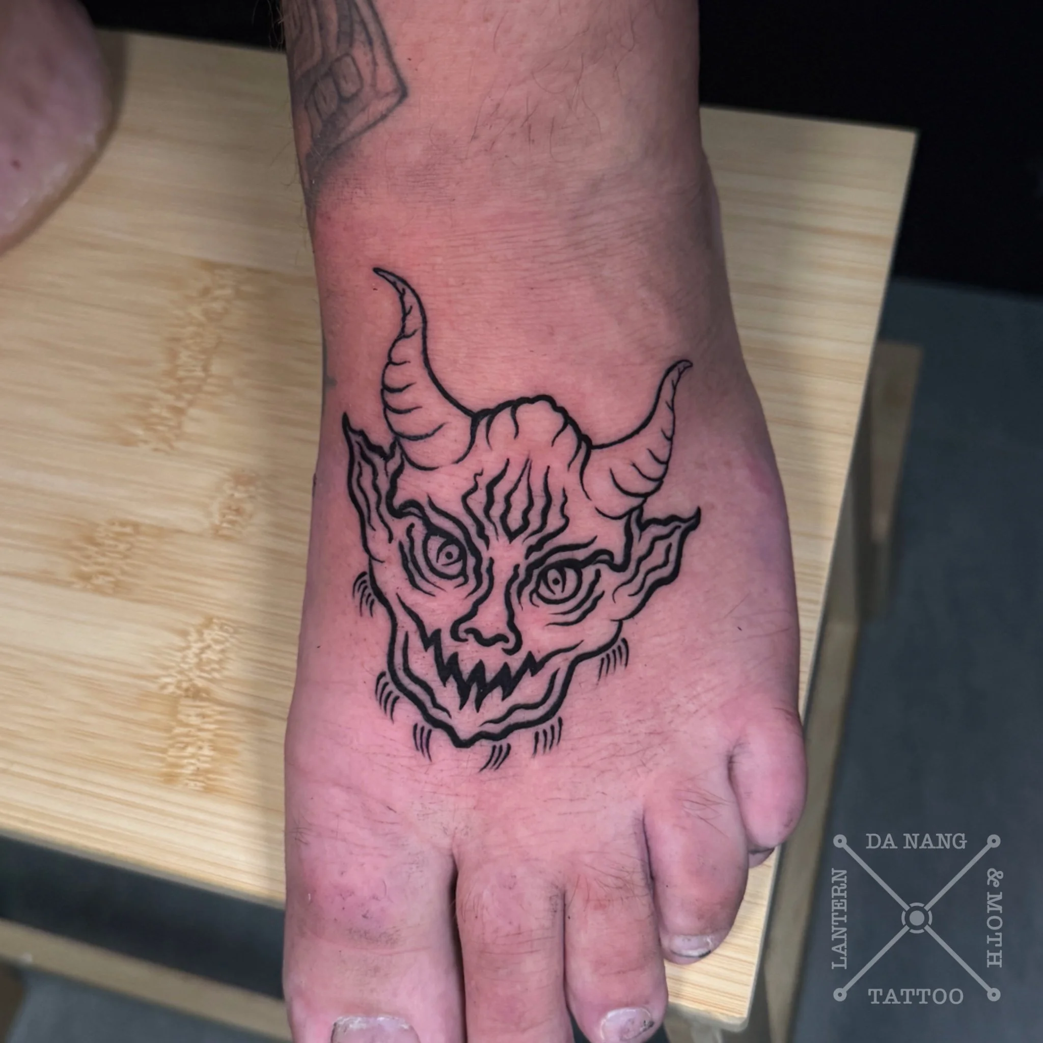 Black work Demon tattoo by Lantern and Moth Tattoo Da Nang, Vietnam.