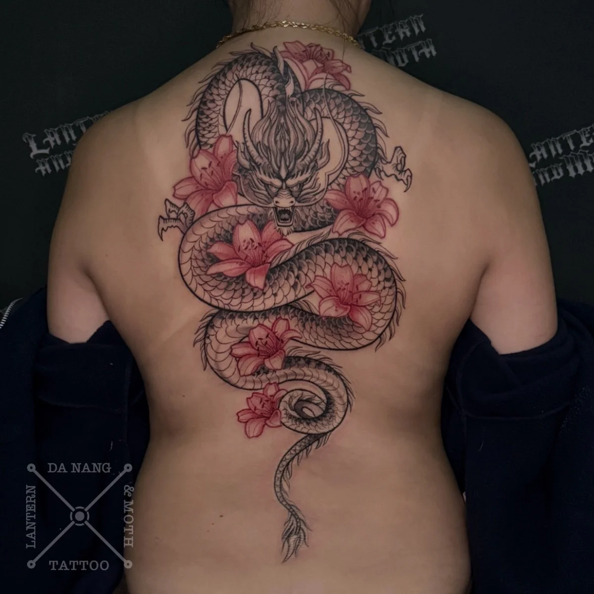 Dragon and Lillies back piece tattoo by Lantern and Moth Tattoo Da nang, Vietnam.