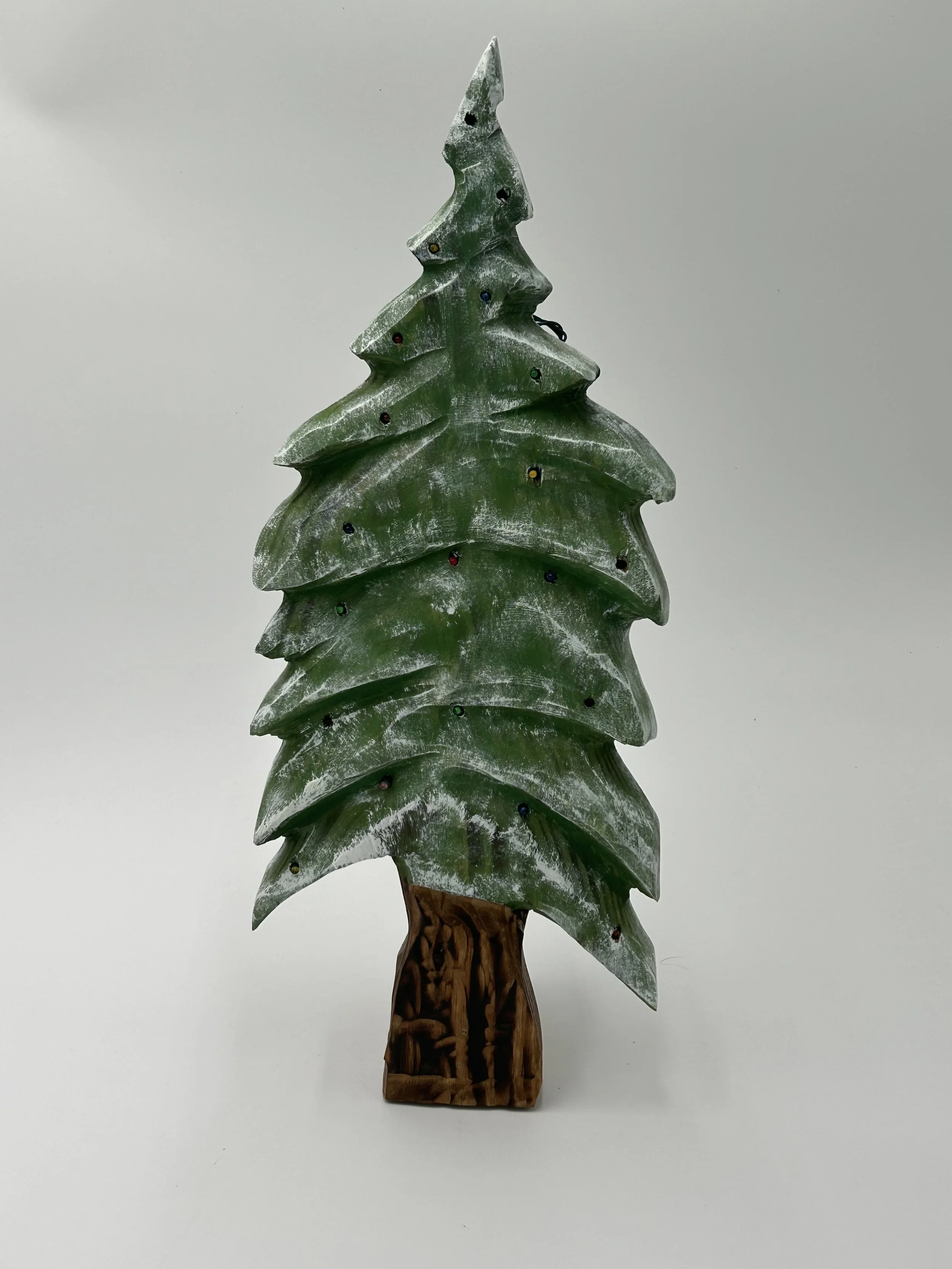 Carved lighted Trees