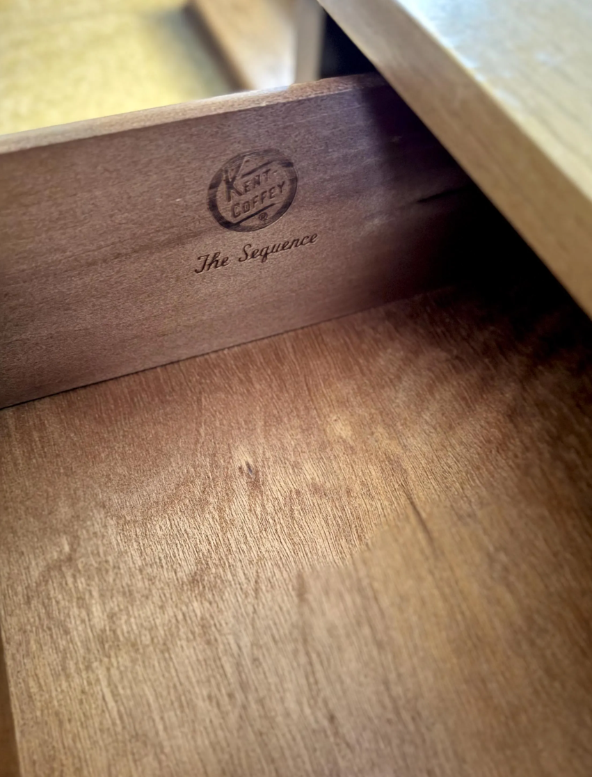 Authentic Kent Coffey branding inside the drawer, stamped with Kent Coffey The Sequence, confirming its originality. The interior wood is clean and well-preserved.