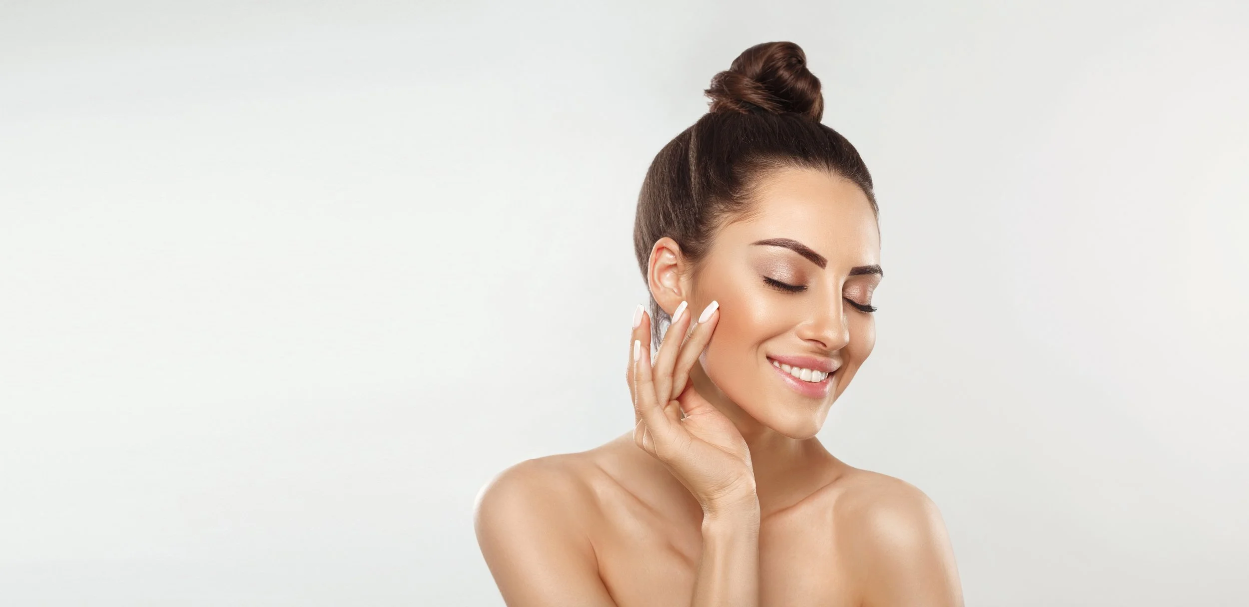 Clean, professional medical spa treatment room with neutral tones at Medspa | Milan Medical in Las Vegas