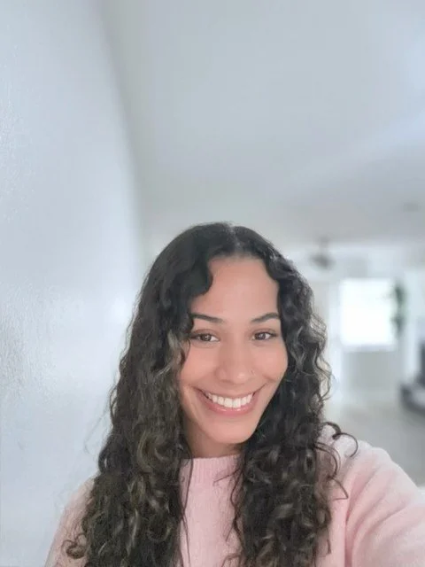 an image of Taylor Parks smiling at the camera