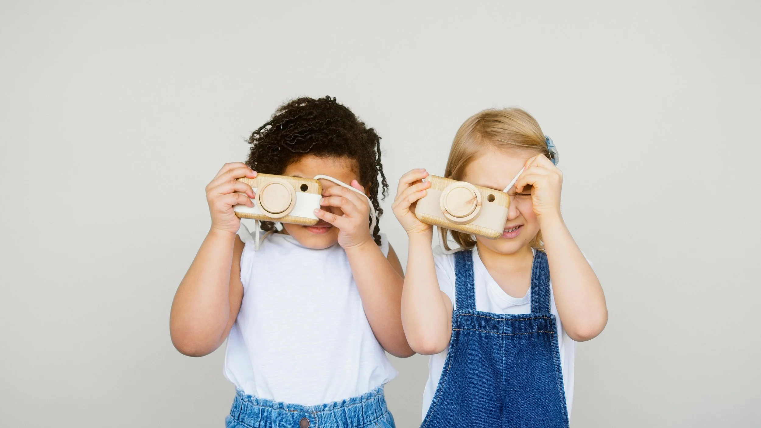 children holding cameras
