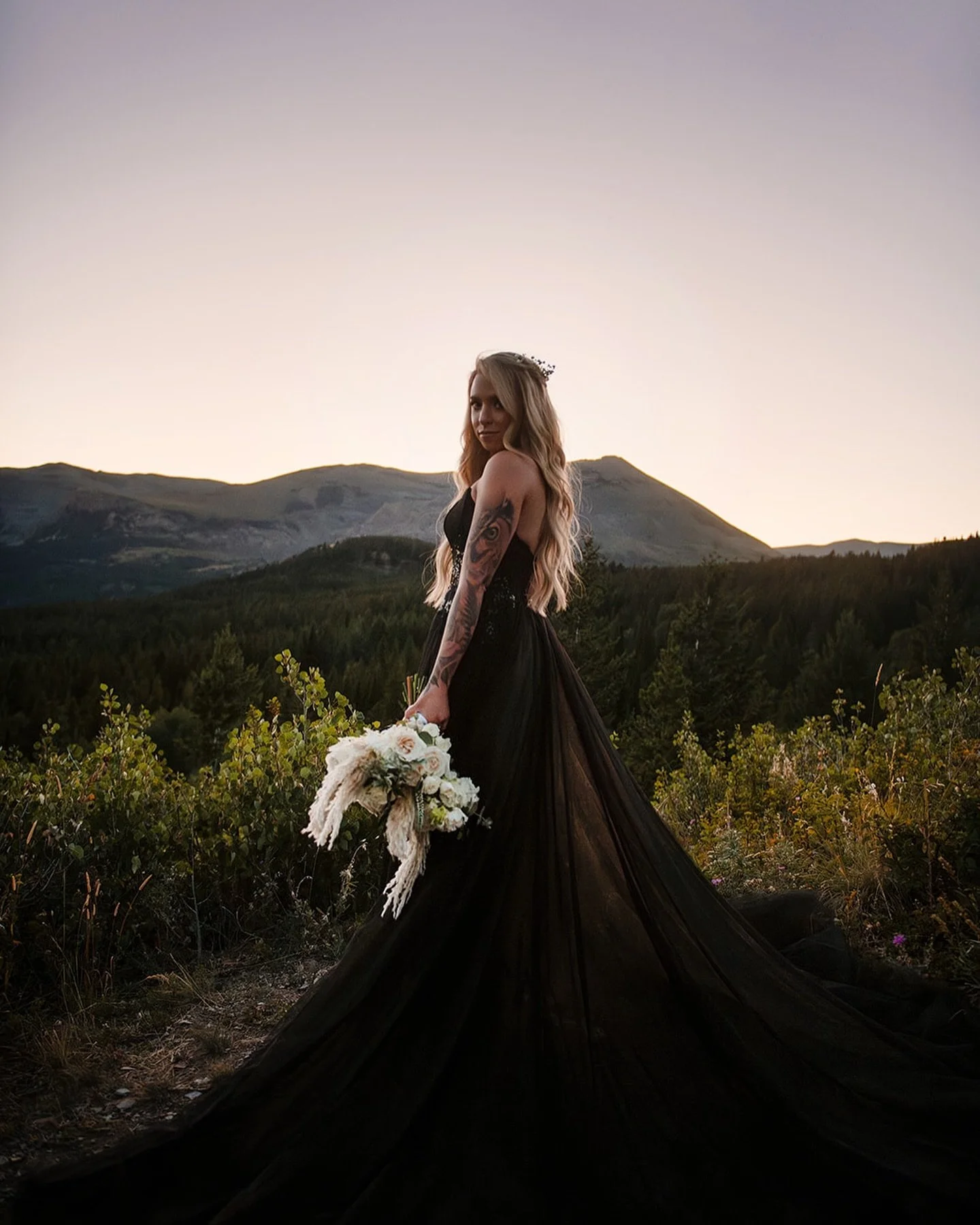 I feel like these jaw dropping photos need some sort of powerful woman quote with them. 
With all my creativity, I have nothing at the moment. But stay tuned I might drop something in the comments 🖤 

Bride/Model @crashtestblondie 

Hair color and E