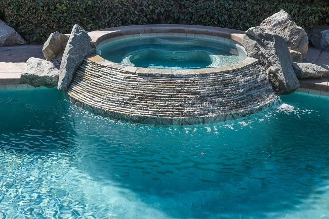 Three Reasons to Add a Water Feature to Your Custom Pool