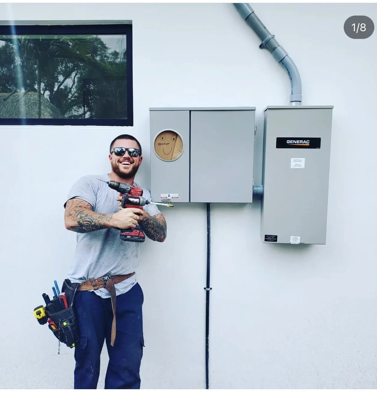 The owner of electric pov smiling on a job site