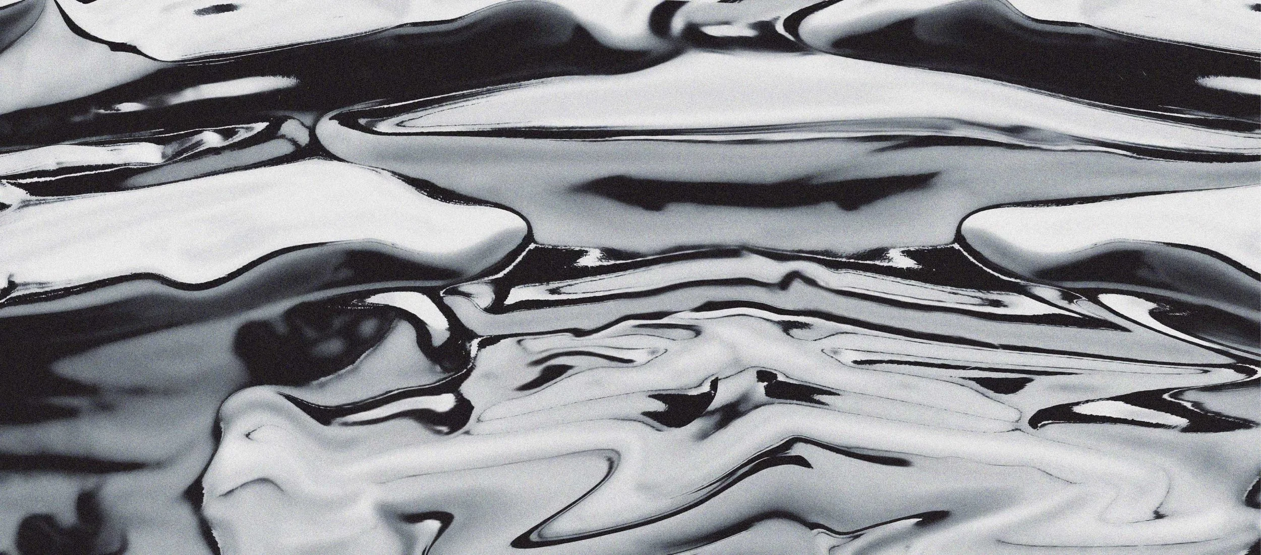 Programmartica logo background - Close-up of black and white marbled surface with flowing, abstract patterns.