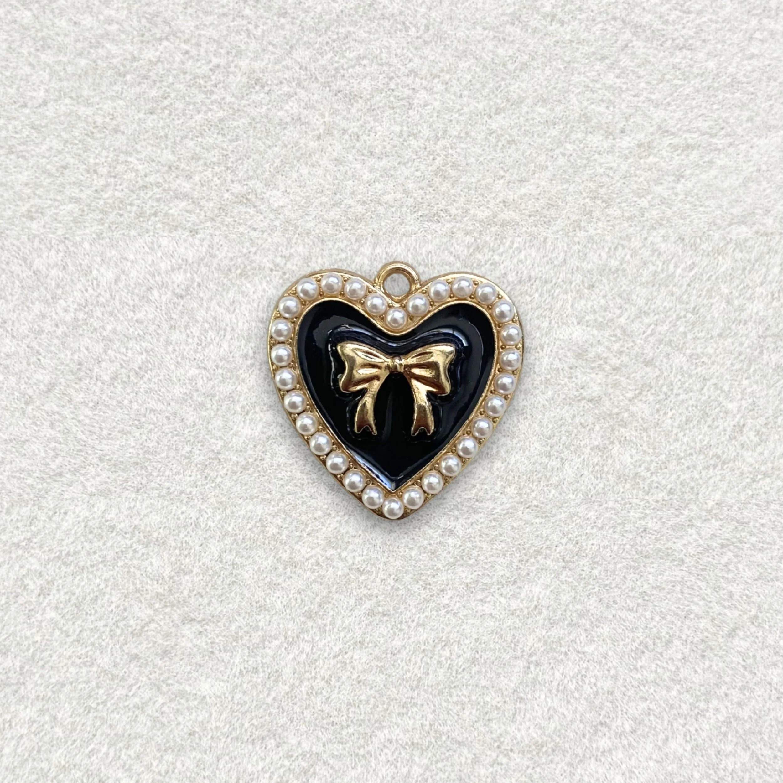 Pearly Black Heart Bow Charm